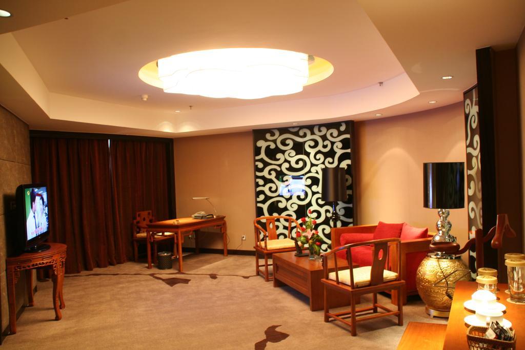 Green Land Hotel Kunming Quarto foto